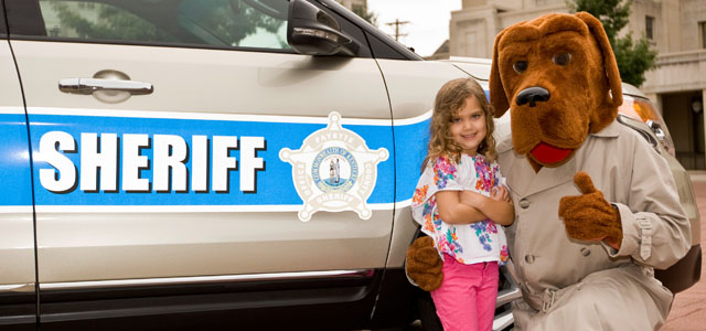 McGruff the Crime Dog visiting children in Fayette County